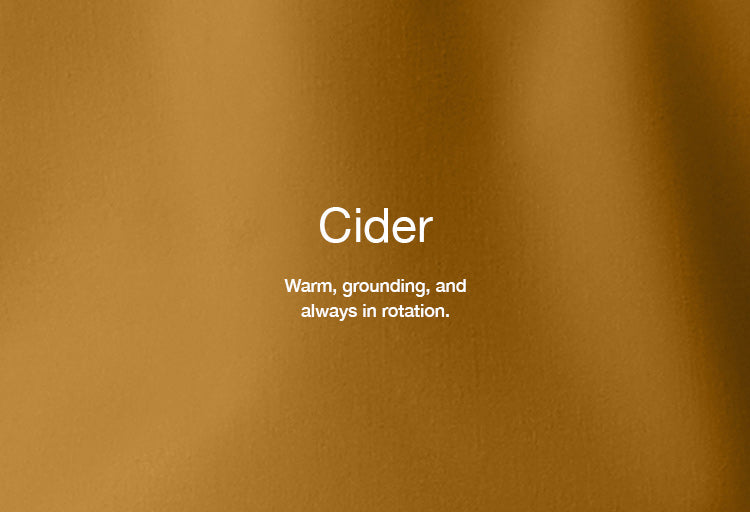 Image of Cider scrub fabric with text, "Cider: Warm, grounding, and always in rotation."