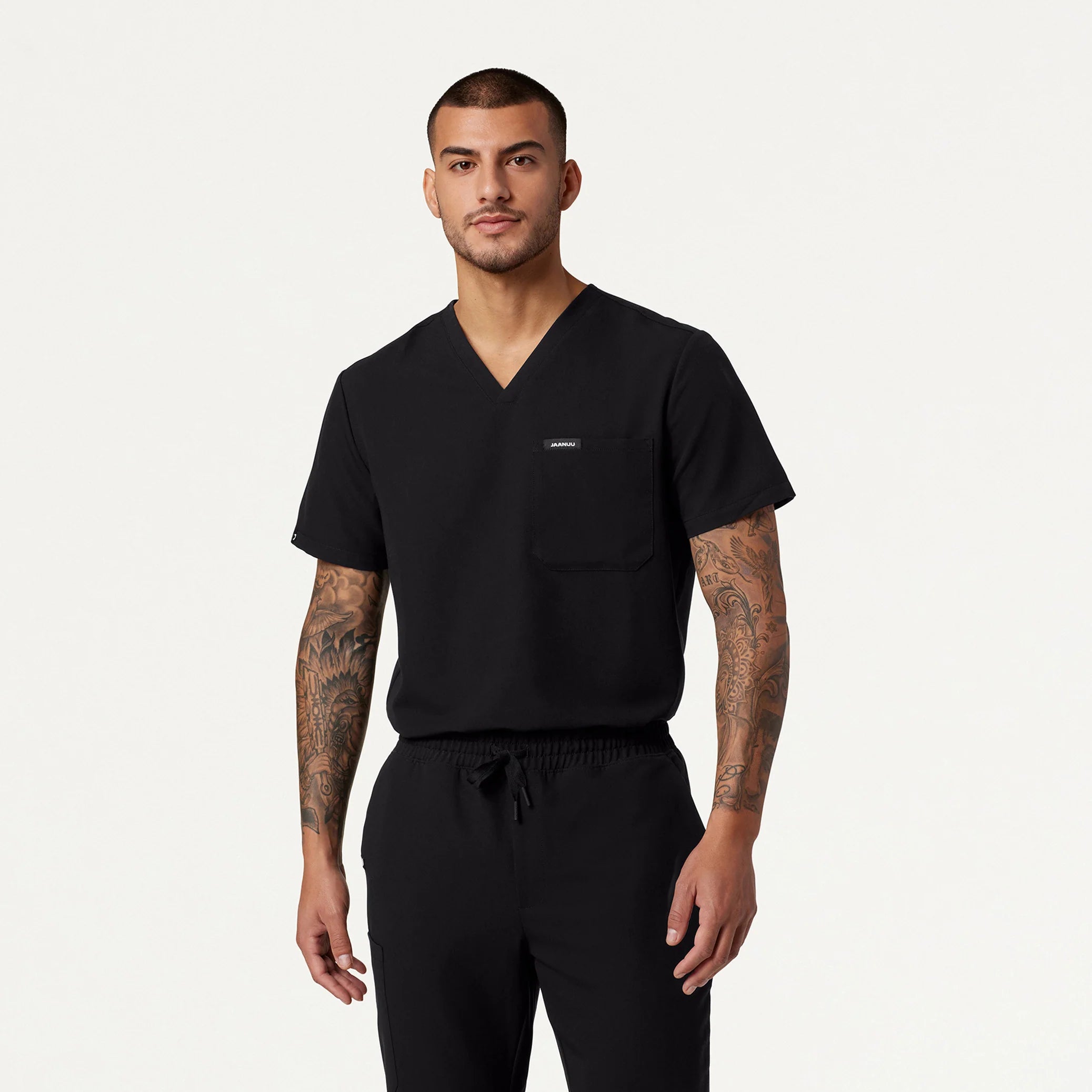 Man wearing black scrub set