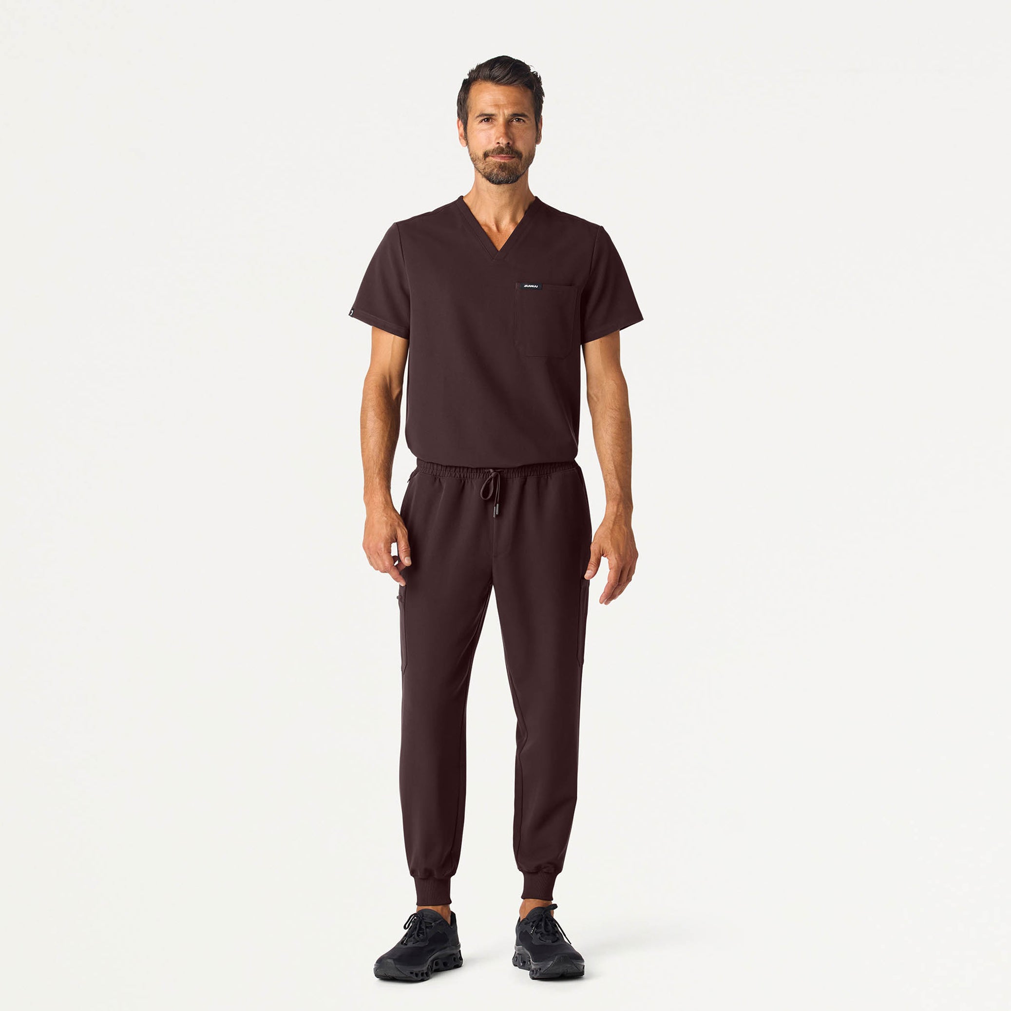 Man wearing an Espresso scrub set