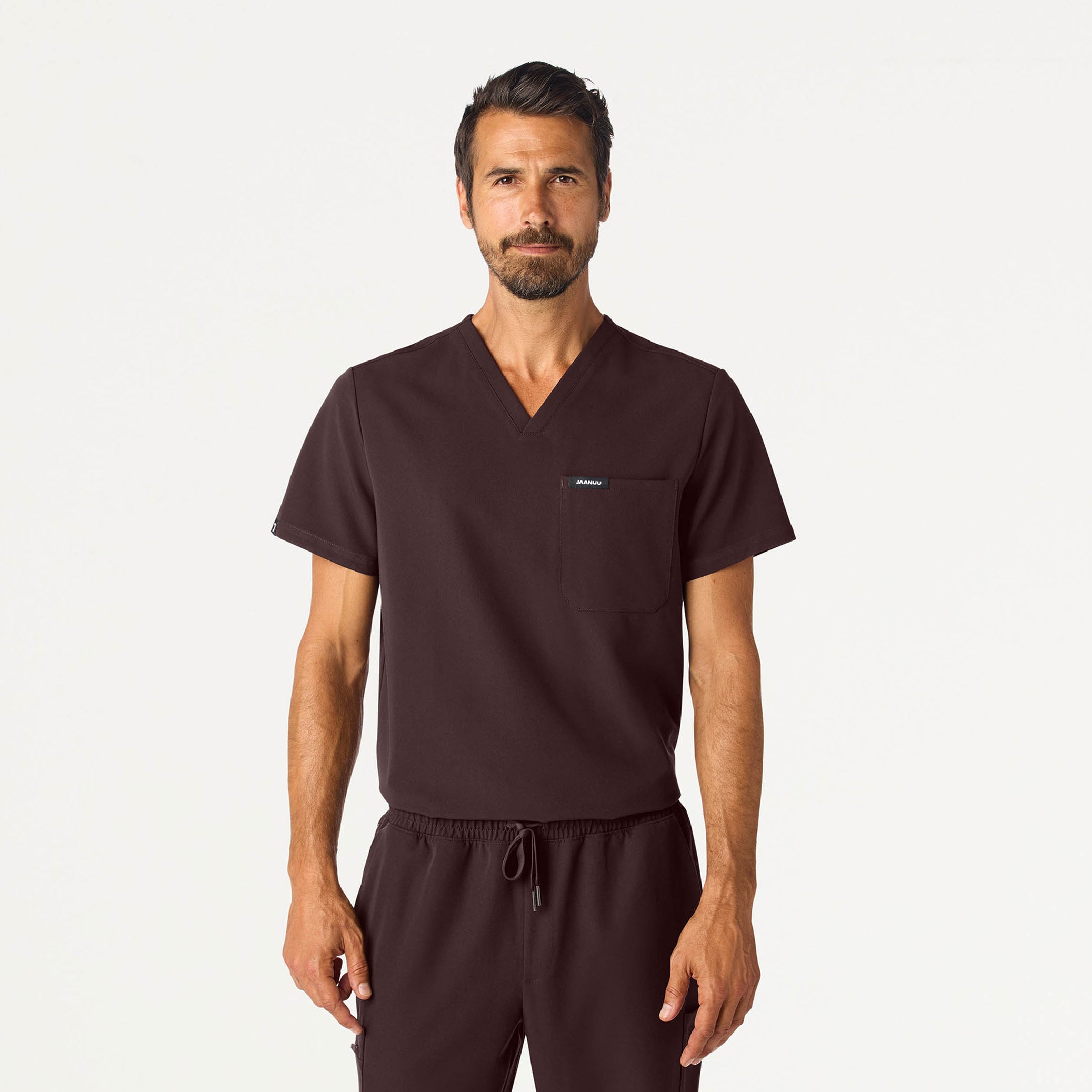 Man wearing an Espresso scrub top