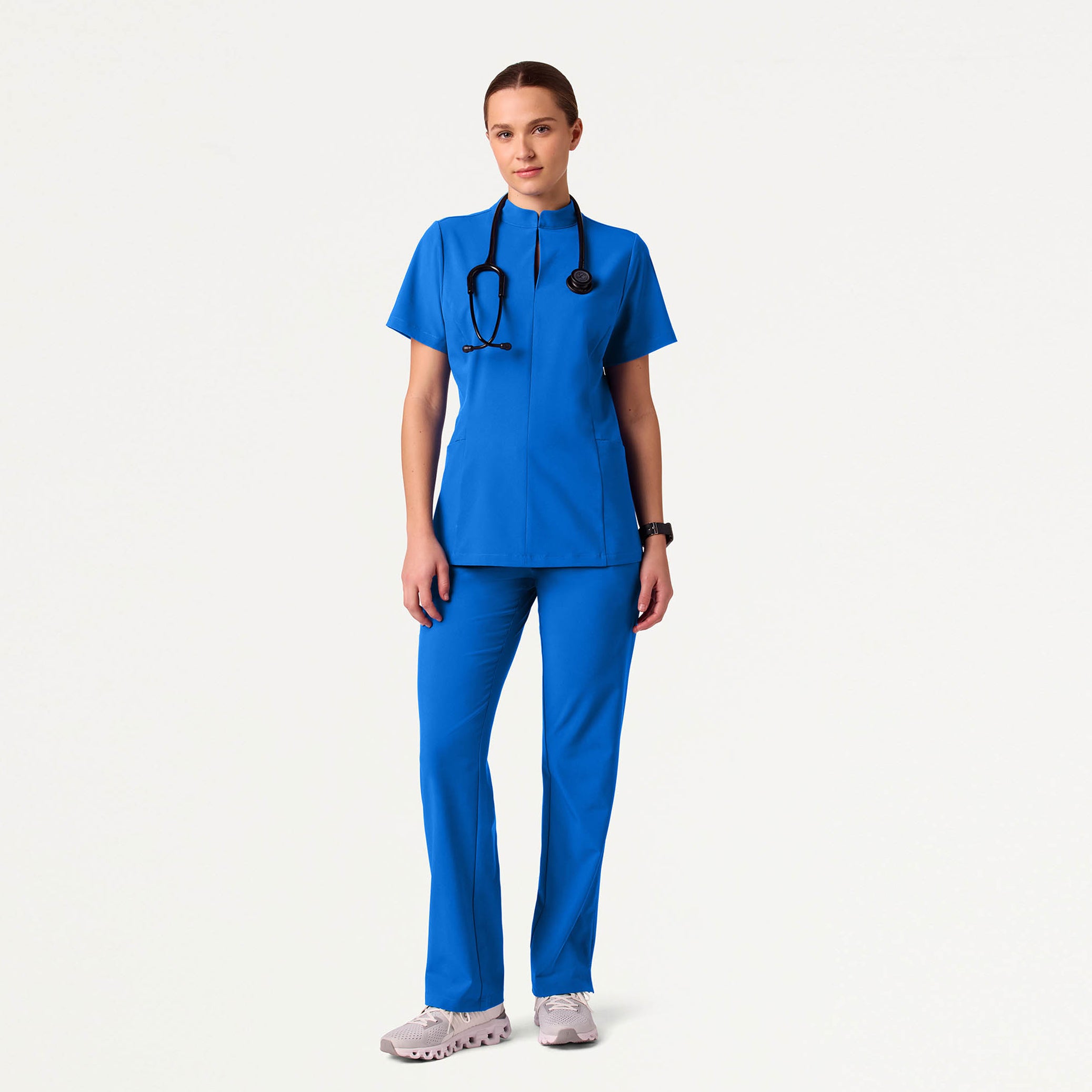 Woman wearing Royal Blue scrubs
