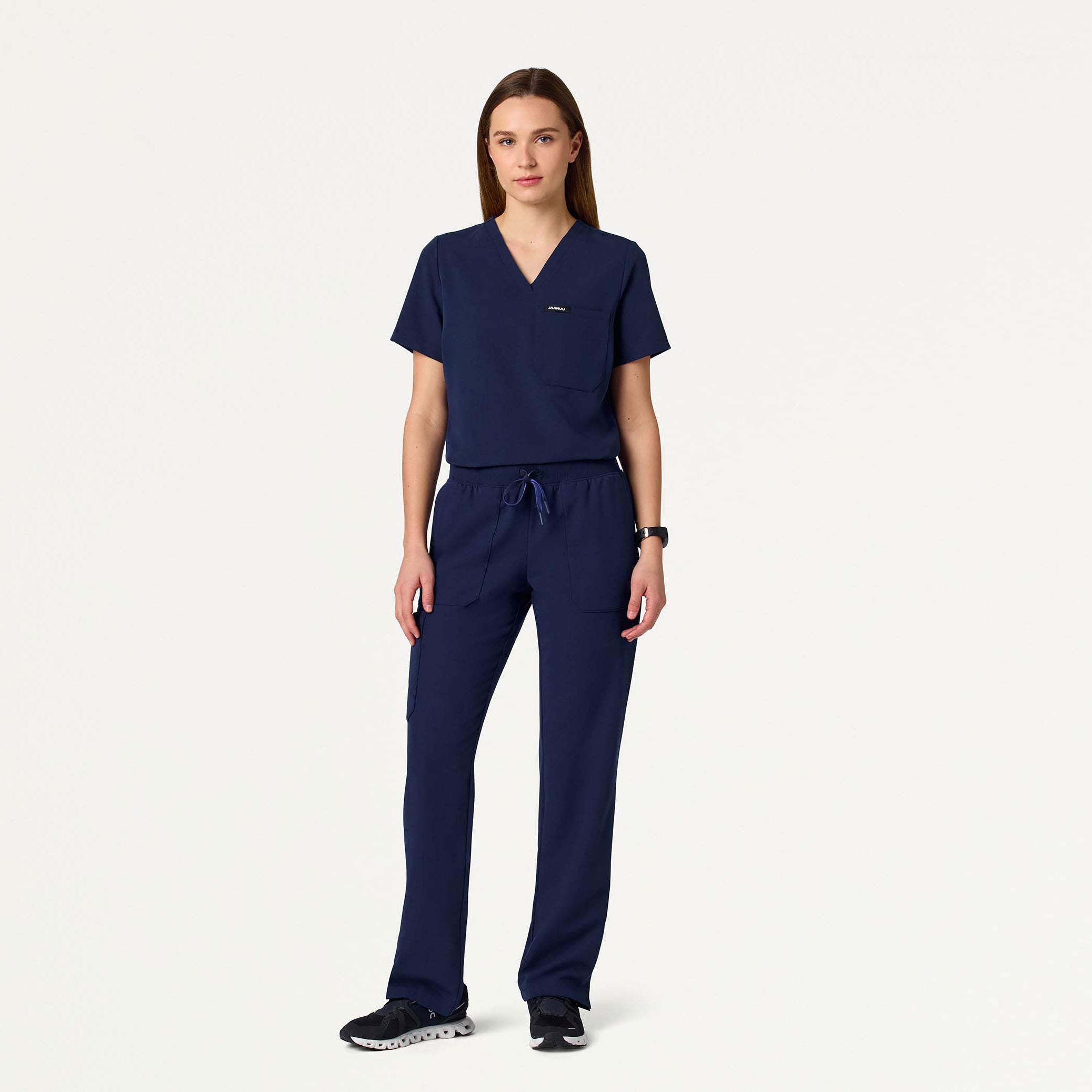Woman in midnight navy scrub set