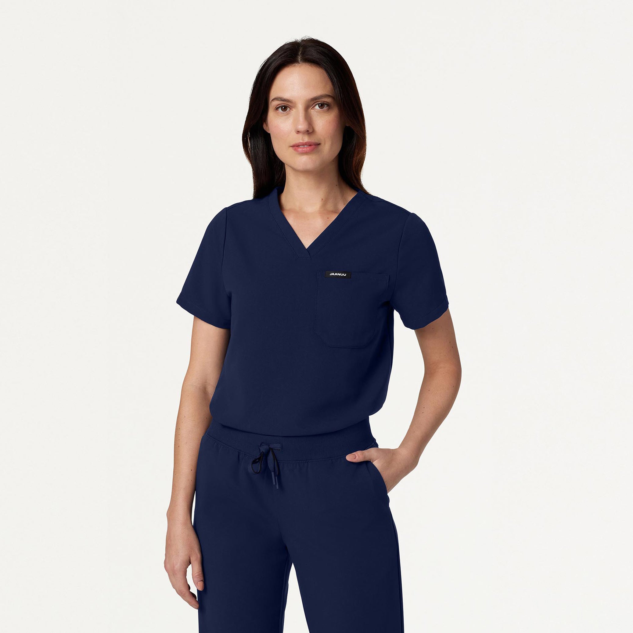 Woman in midnight navy scrub set