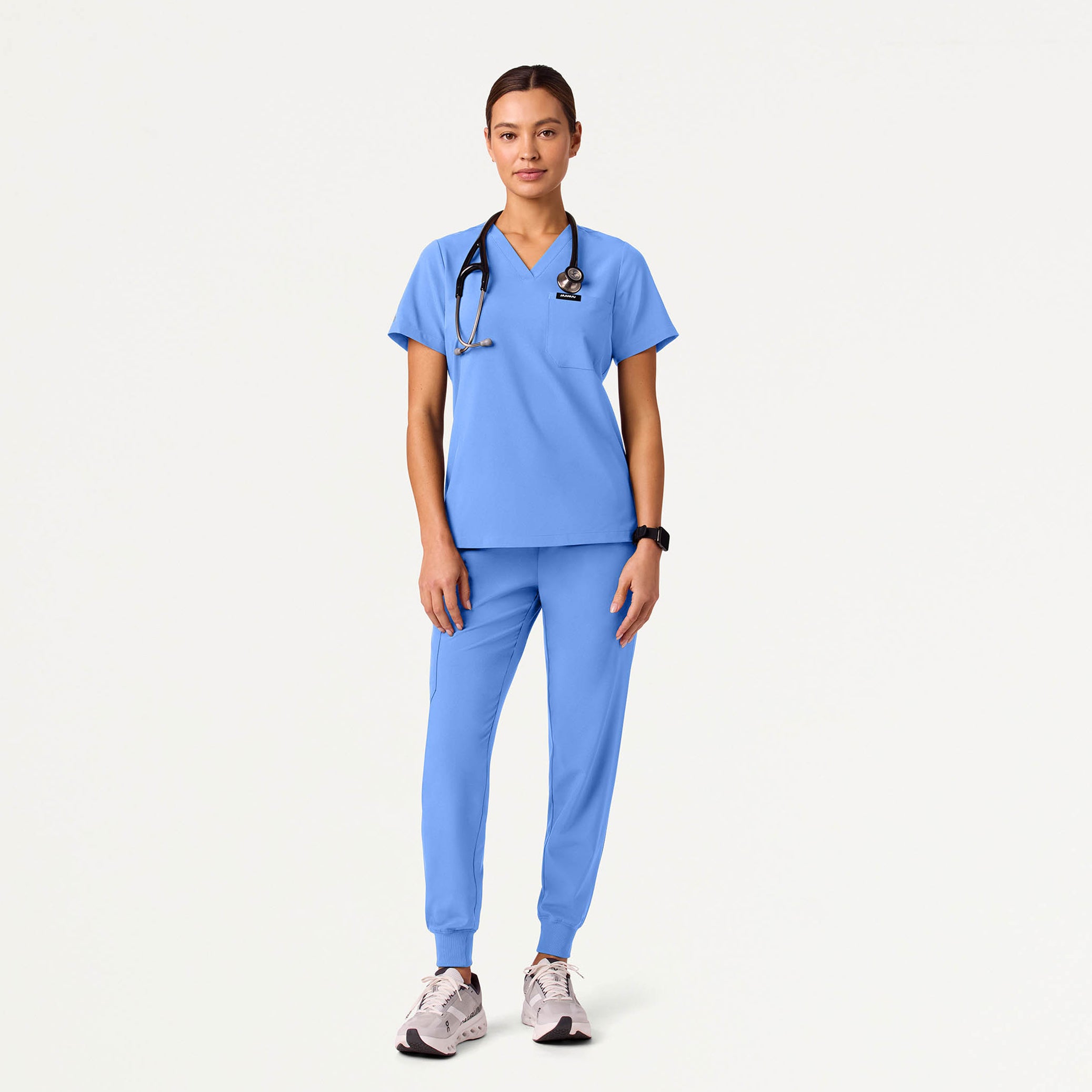 Woman wearing Ceil Blue scrubs
